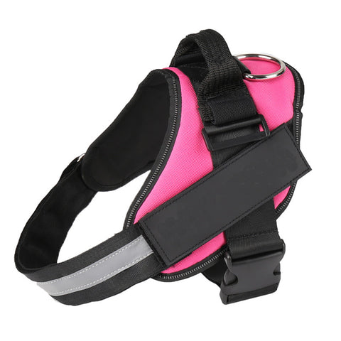 Pink dog harness with black straps and reflective strip on a white background