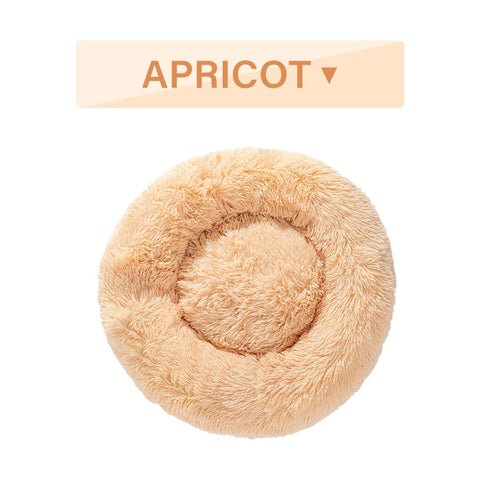 Fluffy apricot-colored pet bed with 'APRICOT' label above it on a white background