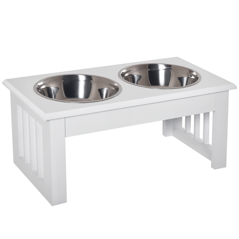 White elevated dog bowl feeder with two stainless steel bowls on a white background