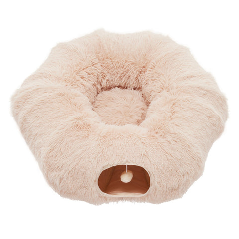 Fluffy pink pet bed on a white background