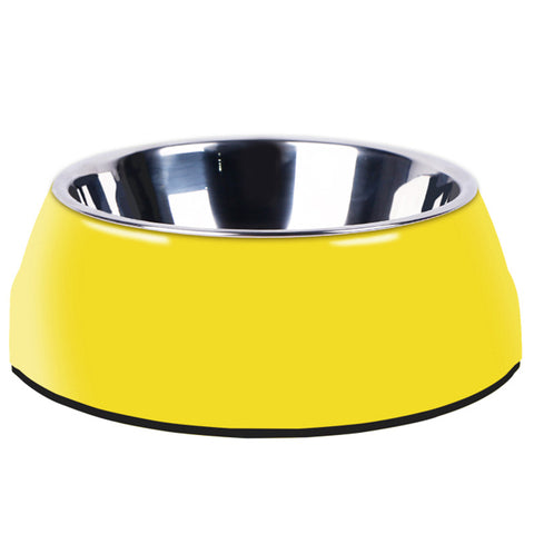 Yellow pet bowl with a silver interior on a white background