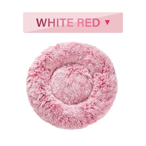 Pink fluffy pet bed with 'White Red' label on a white background
