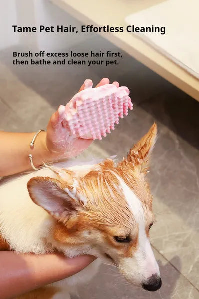 Dog getting a bath while a hand rubs off loose fur with a pink silicone massage brush